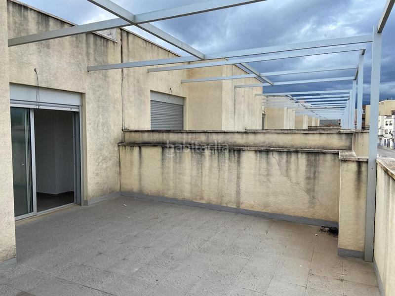 Foto f3ba55ed-2b00-4e59-82f4-d0150df86723. Casa adosada  con garaje en Roquetes