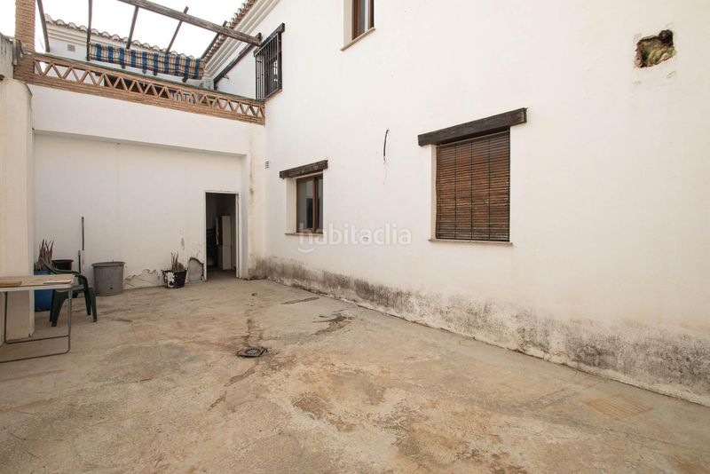 Foto 121e0a5b-e371-4507-ade1-b6ba6c65a4ce. Casa adossada a calle cordoba a Güevéjar