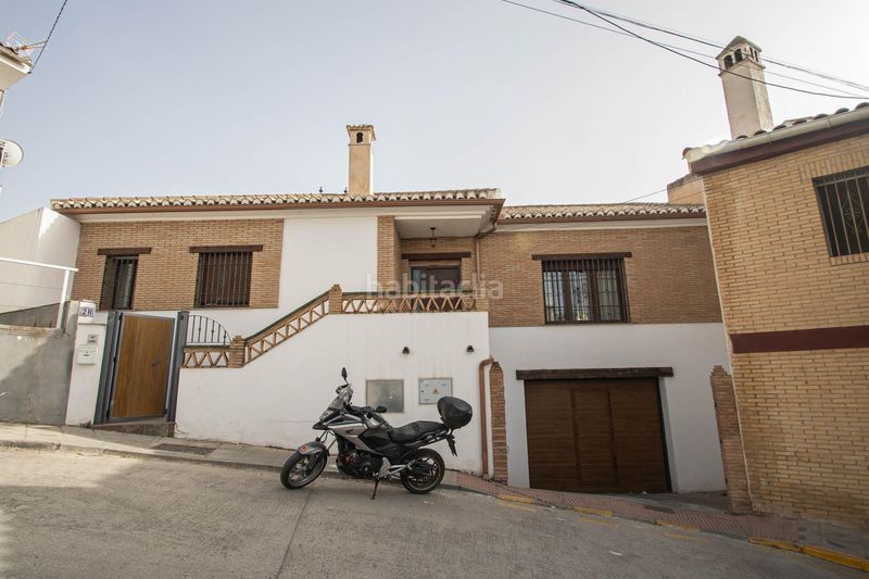 Foto 12e717c5-49a5-4f92-ad0f-07e2444266a9. Casa adossada a calle cordoba a Güevéjar