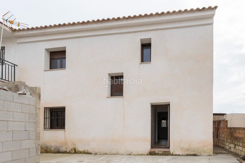 Foto f71f688b-c7c0-4e59-8a9d-8f0691950b75. Casa amb aparcament a Dílar
