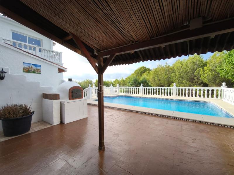 Foto a79c8283-3e42-4c57-a90c-fcd3fe86878e. Chalet  en venta en nucia la, 4 dormitorios. en Nucia (la)