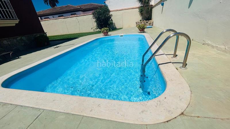 Foto e1f5e909-6c3c-43d6-b085-67c8c732accc. Chalet avec parking piscine dans Las Lagunas - Campano Chiclana de la Frontera