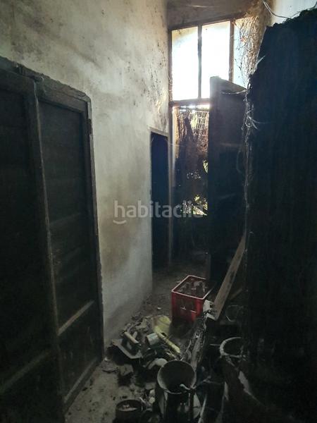 Foto 26f5f62e-132b-48b0-af80-19c2446015cb. Casa adossada a calle rajolar de baix 79 a Borriol