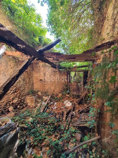 Foto 7c6b59c6-2b7b-4f08-a315-26e017f4e14d. Casa adossada a calle rajolar de baix 79 a Borriol