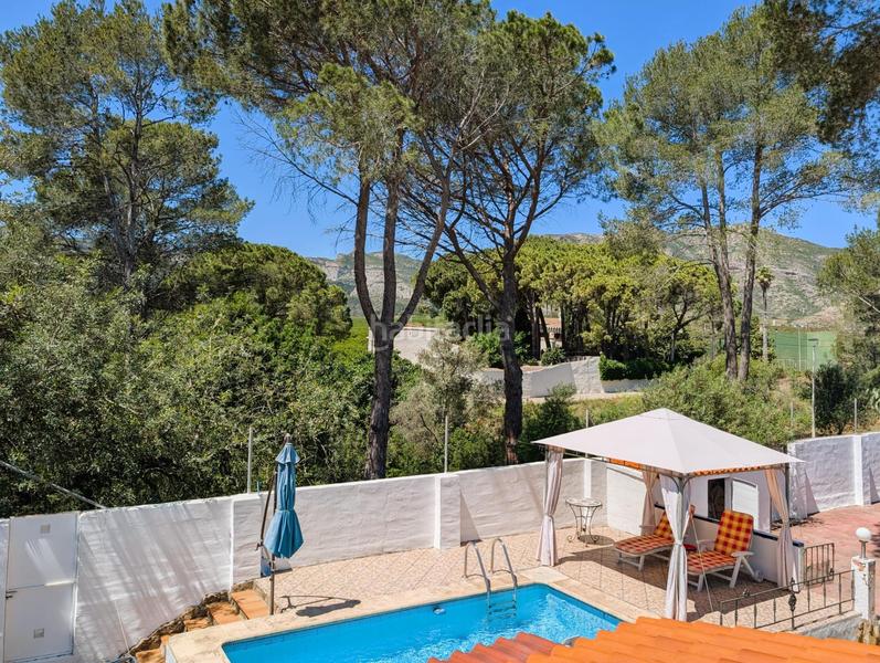 Foto 4be33bc0-1b8c-43f6-bda6-11d58d13571a. Chalet avec chauffage parking piscine dans Urbanizaciones Gandia