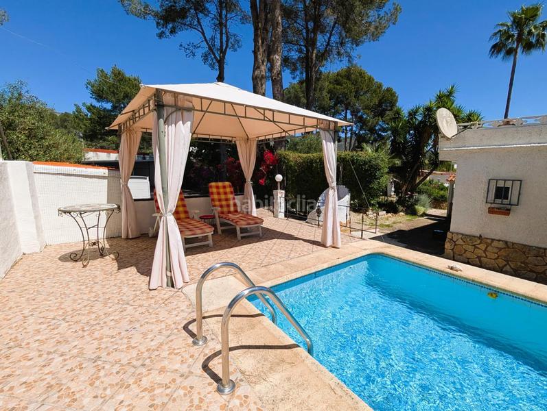 Foto 7ab6c3c7-70b8-4333-8fea-b0e08a6fbd05. Chalet avec chauffage parking piscine dans Urbanizaciones Gandia