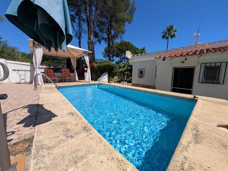 Foto 8fcf7e8c-686f-4f7e-b7e9-7eb63495de8d. Chalet avec chauffage parking piscine dans Urbanizaciones Gandia