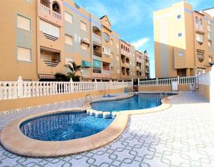 Apartament a Calle adriano 11. Apartamento con piscina a 200 metros de la playa en la mata - to