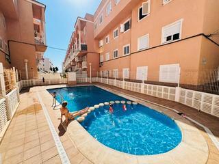 Appartement à Gaspar Perelló. Apartamento 1 dormitorio con piscina comunitaria junto al mar