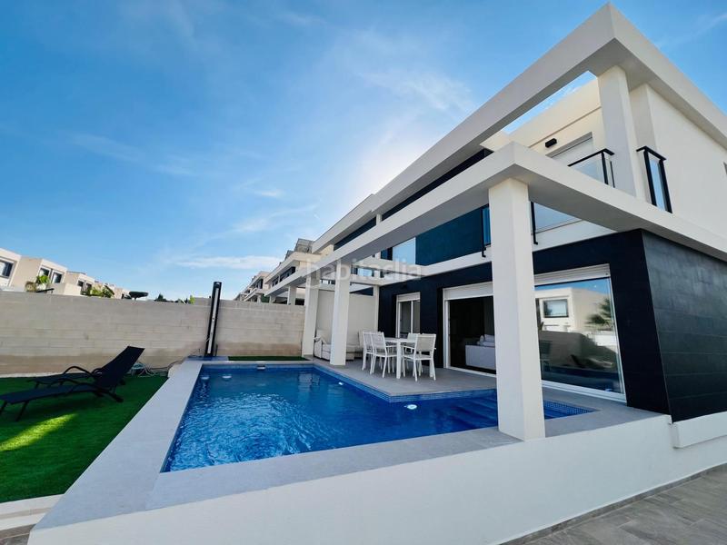 Foto 7b6a8780-fe49-433f-a397-fe774a258605. Maison jumelée avec chauffage parking piscine dans Monte y Mar Santa Pola