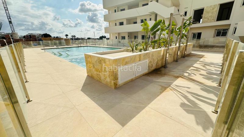 Foto 223b7da1-fabe-41dd-8283-c97deee6c071. Piano terra con riscaldamento parcheggio piscina in Guardamar del Segura