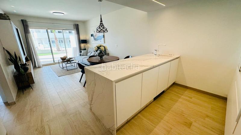 Foto 31550ab4-eef1-4d47-a69e-0451734ff3d8. Piano terra con riscaldamento parcheggio piscina in Guardamar del Segura