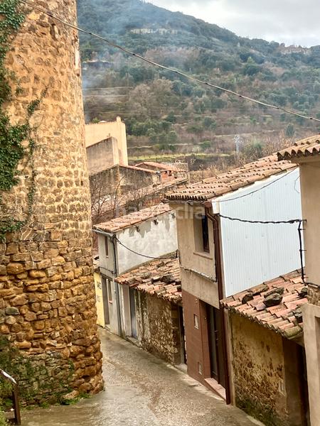 Foto 35b8e894-b6e9-4f4b-b1c6-4fc6e67fefdc. Casa en carrer mur 23 casa en venta en benassal junto a la torre redonda en Benasal
