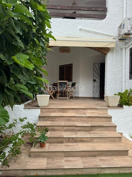 Foto 485a76f5-6d1d-4d96-ad4d-12d6533411c2. Planta baixa amb xemeneia calefacció a Mareny de Barraquetes Sueca