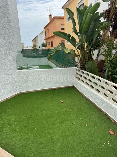 Foto 8d4140b4-0643-4d28-9a16-fa0e96d8c811. Planta baixa amb xemeneia calefacció a Mareny de Barraquetes Sueca