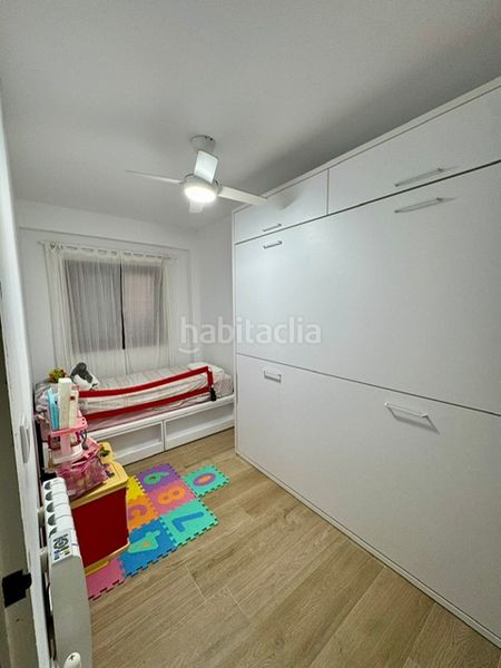 Foto acafb1d0-e6eb-47f0-a5eb-186b33f90923. Planta baixa amb xemeneia calefacció a Mareny de Barraquetes Sueca