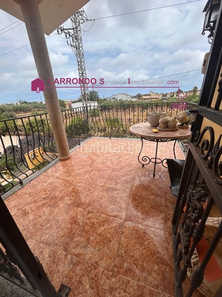 Foto 59a322aa-2a24-4cdc-8a7b-5d5e79112d39. Xalet amb xemeneia calefacció aparcament a Las Atalayas-Urmi-Cerro Mar Peñíscola