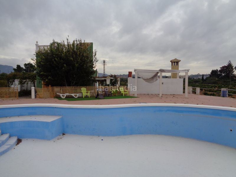 Foto 32f68424-fb44-42bc-9ce1-6c96848488d7. Masia amb xemeneia piscina a Urbanitzacions i Pedanies Nord Alzira