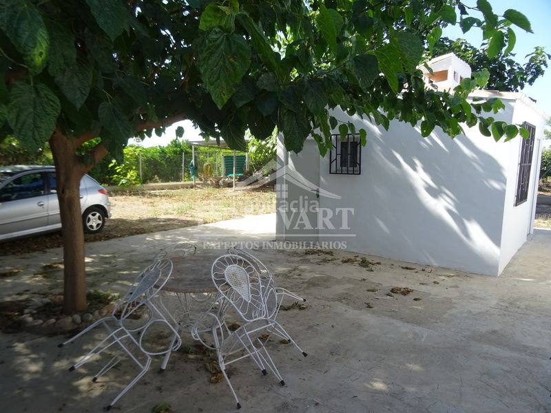 Foto 56604ac8-bc47-4c72-84c2-47e95fd87db5. Masia amb xemeneia piscina a Guadassuar