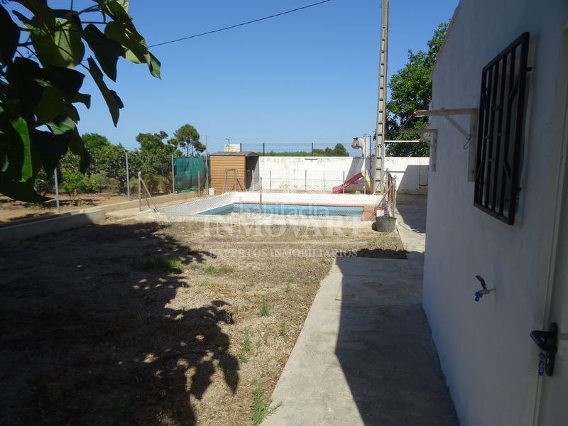 Foto 784e0277-72ff-4d5b-b27a-b1c3f752fb86. Masia amb xemeneia piscina a Guadassuar