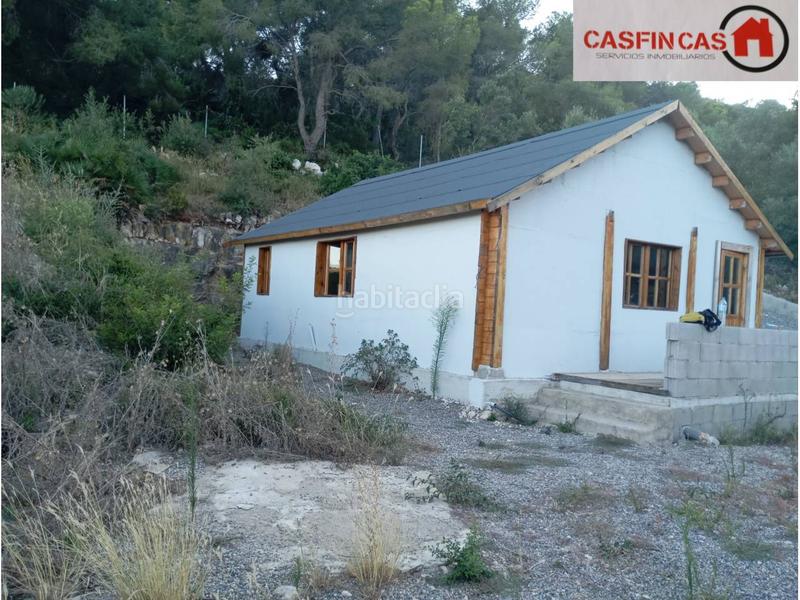 Foto 461b1449-66eb-49a0-8010-a8032462e375. Casa  de madera en urbaniz. los rosales en costa Cunit - els jardins - els rosers Cunit