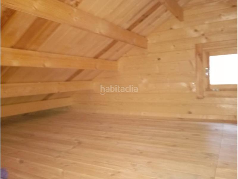 Foto c88b6e7e-3911-4c70-8176-8a349bb1030c. Casa  de madera en urbaniz. los rosales en costa Cunit - els jardins - els rosers Cunit