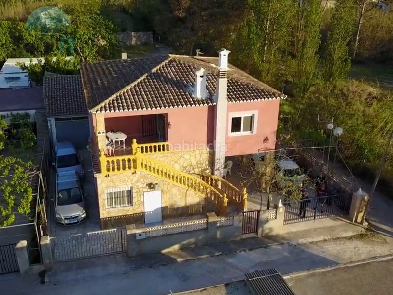 Foto ec45ef80-c5fa-4101-ae59-863d6e755622. Xalet amb aparcament a Oliva nova Oliva