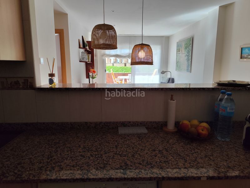 Foto 08f239c2-50ba-4083-a8e9-76e5c735953b. Planta baixa amb calefacció aparcament piscina a Ampolla (L´)