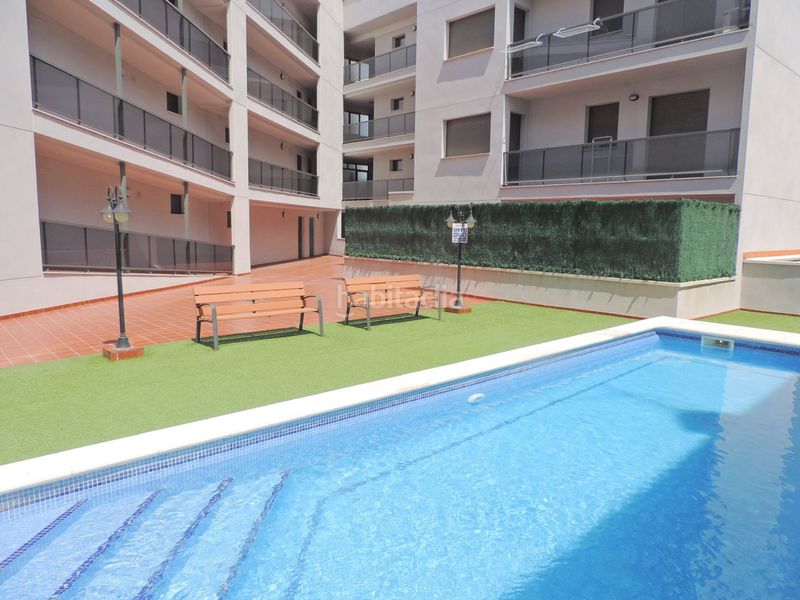 Foto 3d4e6f56-e68b-4c38-83b9-b3cfa7e51c64. Planta baixa amb calefacció aparcament piscina a Ampolla (L´)