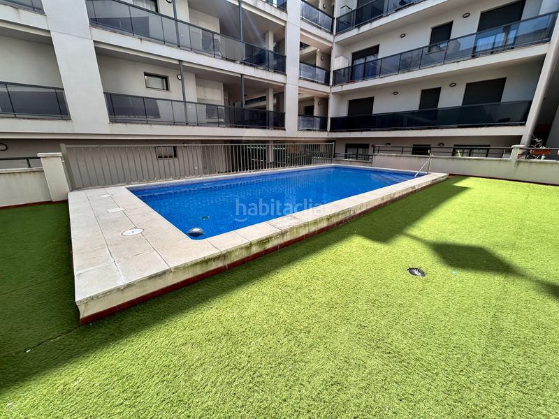 Foto 84d1170c-c867-4fd5-a169-9ef71233d1fd. Planta baixa amb calefacció aparcament piscina a Ampolla (L´)