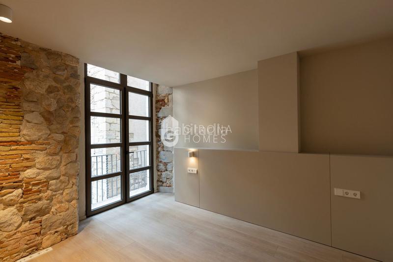 Foto efe8bcd4-2844-400f-a5d6-f250a6b46001. Dúplex a Centre-Barri Vell Girona