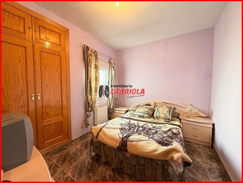 Foto 30688250-a050-4a1d-8221-fb8052e7cdf9. Casa adosada en Quismondo