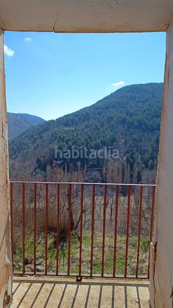 Foto bee33570-4a71-439f-8694-ac84e69b3af6. Bauernhof mit kamin in Soriguera
