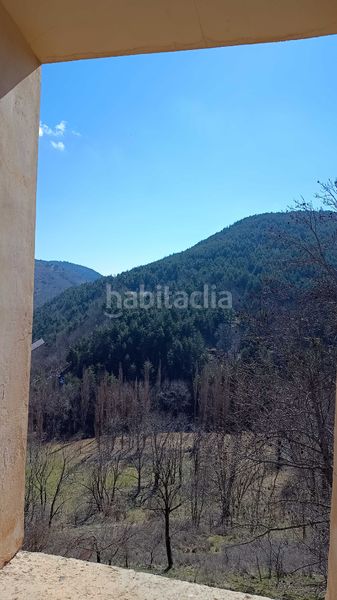Foto bfc96f20-7437-4cb0-afe9-82d3ca5856ea. Bauernhof mit kamin in Soriguera