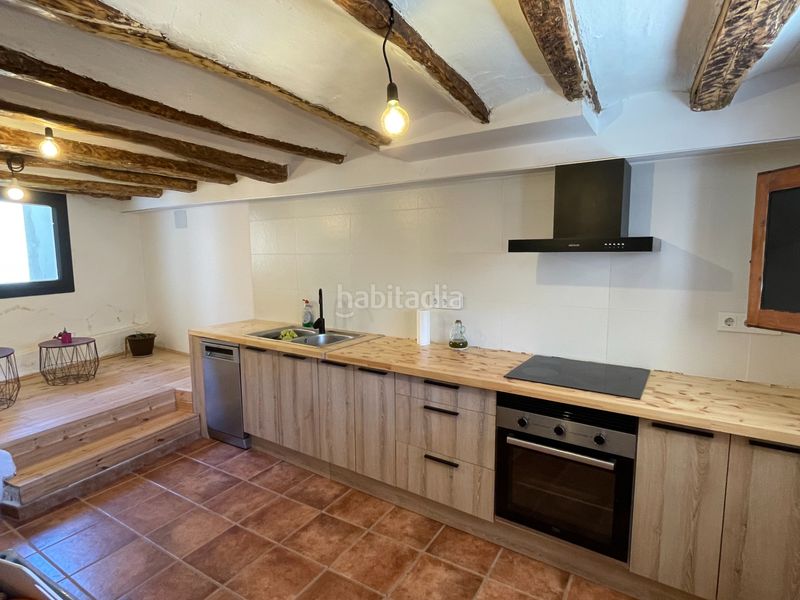 Foto 4fc85030-16a5-4bc8-8572-429b5d8f2641. Casa a carrer llessui poble 130 a Sort