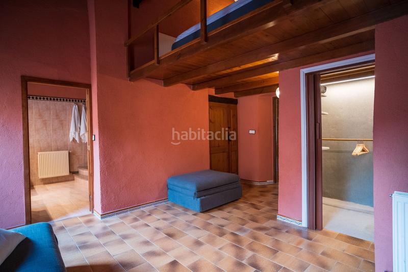Foto 96dbe5bf-1082-4fc7-88c4-a4c049a67fb2. Masía casa rústica con piscina interior y terraza en Boadella i les Escaules