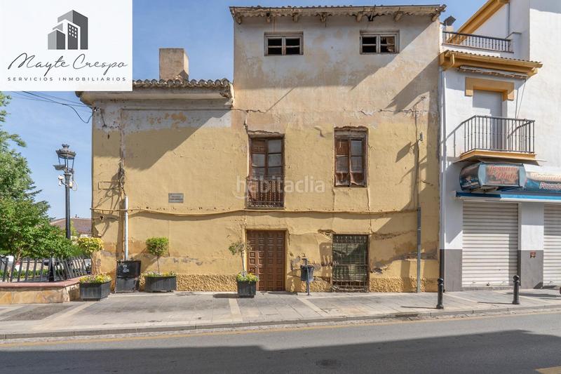 Foto bfdb19d1-c46b-4a75-a12f-61258631faec. Casa  de tres plantas con 288 m2 a reformar frente al ayuntamiento en Ogíjares