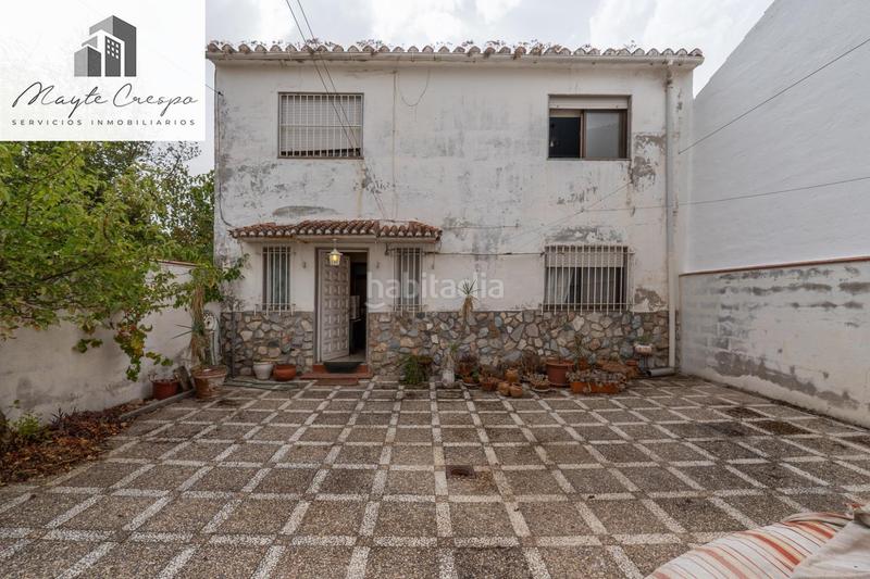 Foto 5a44a0f5-bd13-49c4-aab9-11593d5c21ce. Chalet en camino de la barrera (far) 58 el Fargue 2000 metros de parcela segregable con chalet de 178m en tres plantas mas nave de 90 metros en Granada