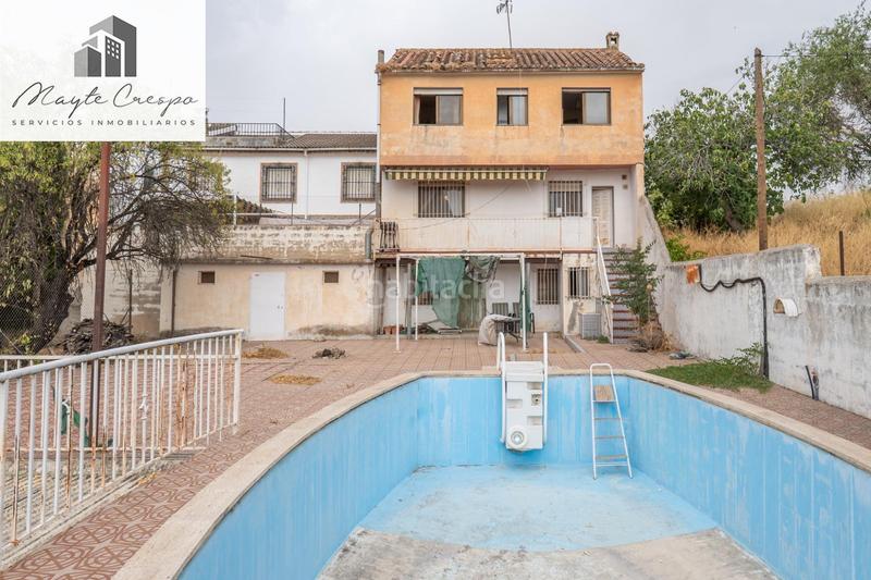 Foto 9063f6fb-b722-4800-a76a-76b80457a4ff. Chalet en camino de la barrera (far) 58 el Fargue 2000 metros de parcela segregable con chalet de 178m en tres plantas mas nave de 90 metros en Granada