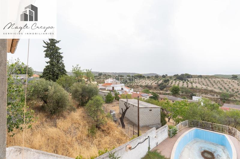 Foto 9bd100ed-89b3-4249-a35a-53615f985888. Chalet en camino de la barrera (far) 58 el Fargue 2000 metros de parcela segregable con chalet de 178m en tres plantas mas nave de 90 metros en Granada