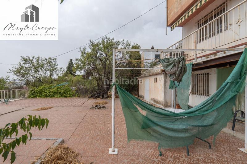 Foto ab9dc4a1-0f84-4ae3-8867-98cca5486f3b. Chalet en camino de la barrera (far) 58 el Fargue 2000 metros de parcela segregable con chalet de 178m en tres plantas mas nave de 90 metros en Granada