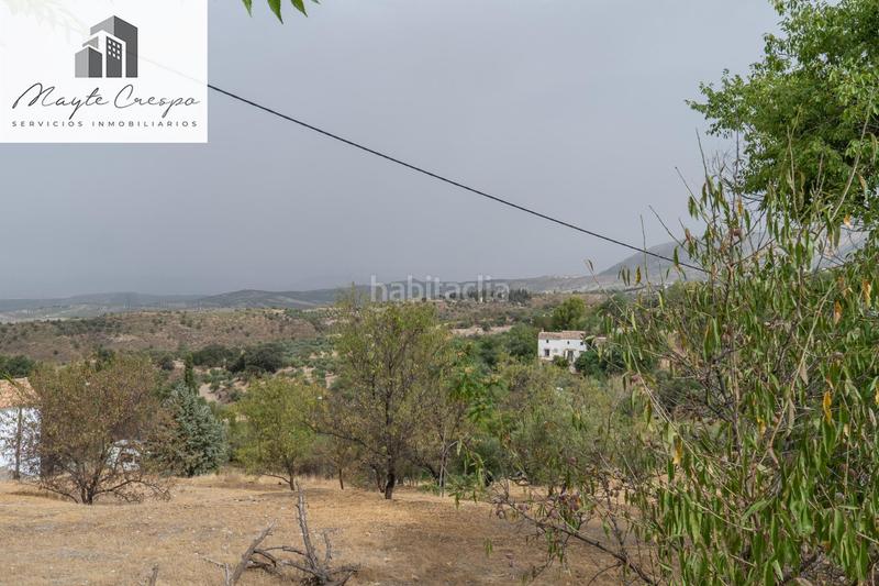 Foto b28a3d96-19f1-4c4b-8ca5-ad544d137094. Chalet en camino de la barrera (far) 58 el Fargue 2000 metros de parcela segregable con chalet de 178m en tres plantas mas nave de 90 metros en Granada