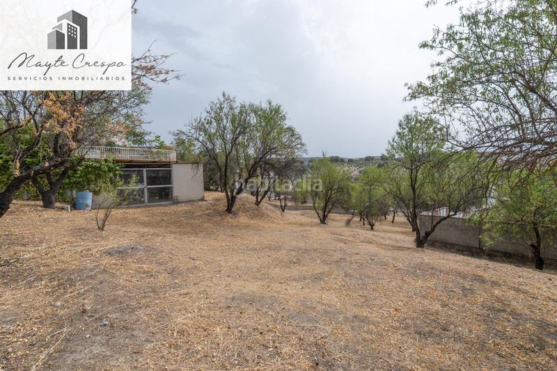 Foto d4376752-2d1e-44ed-8d22-6b03c32f7d9d. Chalet en camino de la barrera (far) 58 el Fargue 2000 metros de parcela segregable con chalet de 178m en tres plantas mas nave de 90 metros en Granada