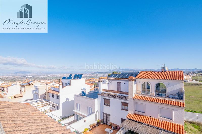 Foto b22c092a-1062-49eb-ac58-cd757665e03c. Casa adossada amb calefacció aparcament piscina a Zubia (La)