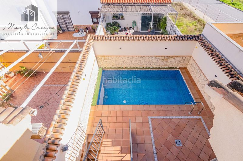 Foto ed3e3972-e2c2-4d3a-8c4f-56da5d5ff759. Casa adossada amb calefacció aparcament piscina a Zubia (La)