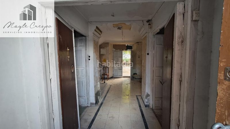 Foto 4d42562a-6f87-488b-bd6e-7f45aea72c8e. Casa adossada amb aparcament a Loja