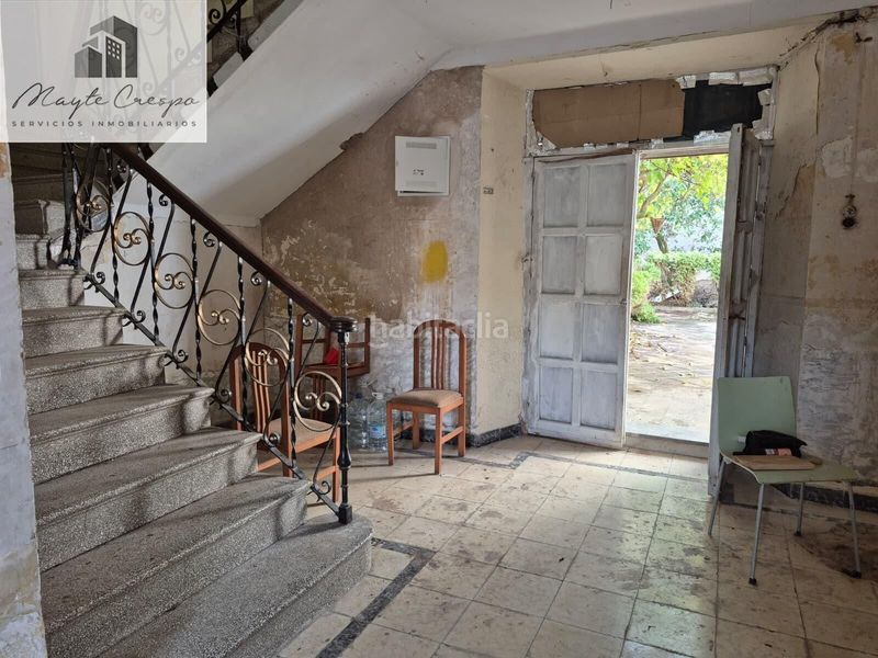 Foto b2d38450-dd64-4f2e-925e-0a7af54591ea. Casa adossada amb aparcament a Loja