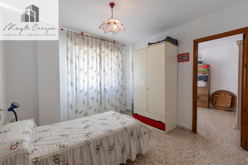 Foto 51147c8c-5e34-4b8c-b865-7679a34a37cf. Casa adossada amb aparcament a Atarfe