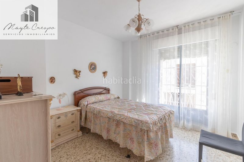 Foto c02ec680-9ac8-45e1-b049-18c06261eb2c. Casa adossada amb aparcament a Atarfe