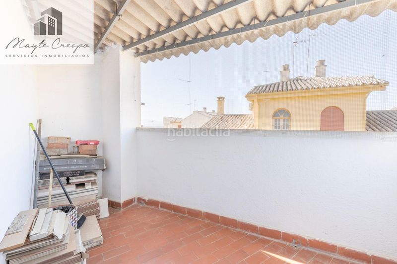 Foto c5289005-865b-4320-8017-4b346d824469. Casa adossada amb aparcament a Atarfe